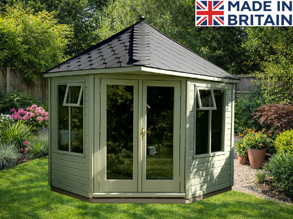 A garden corner garden room with cream coloured wood, double doors and windows.
