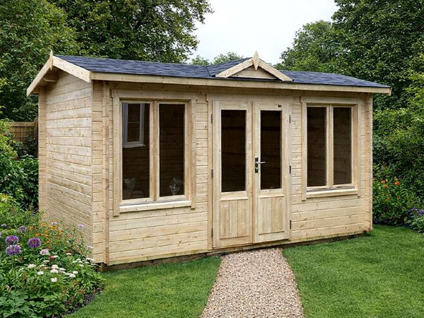 A wooden Clockhouse log cabin with double doors and windows. An optional installation is available.