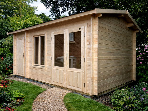 A multi-room log cabin with double doors and windows. An optional installation is available.