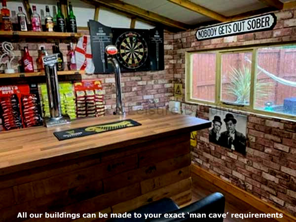 A man cave bar with a dartboard, beer taps, and a window.