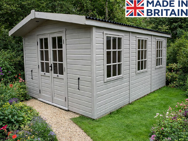 A grey garden studio shed with double doors and windows. A well maintained garden shed.