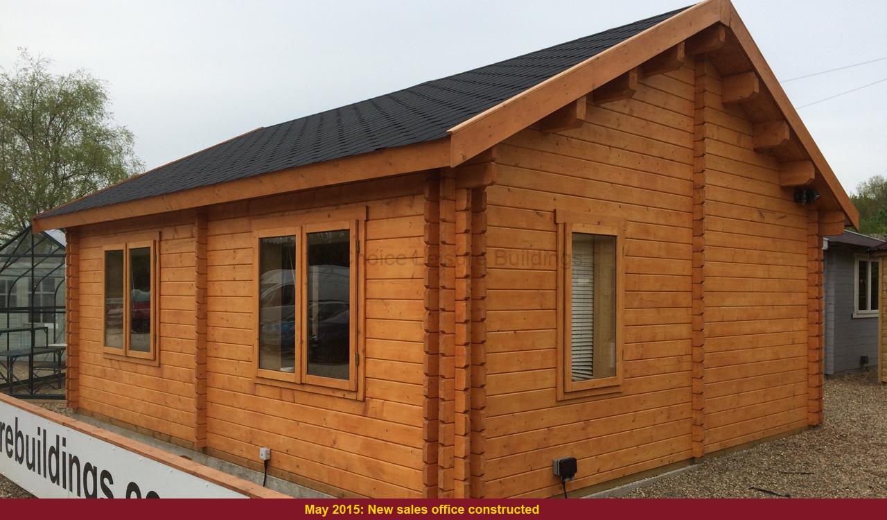 New sales office wooden building A wooden sales office building with a black roof