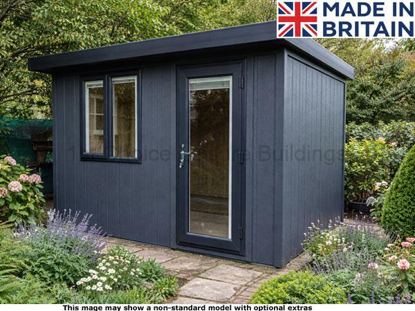 Royal Bletchley 8x6 Garden Room 1 A dark grey garden shed with a double door and two windows, set in a beautiful garden with flowers and trees.