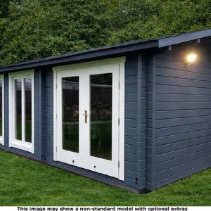 Garden log cabin with dark blue cladding and white doors and windows. A light on the exterior wall is turned on.