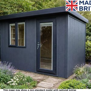 A black Royal Bletchley pent 8x6 garden room with a glass door and two windows, surrounded by flowers and trees.