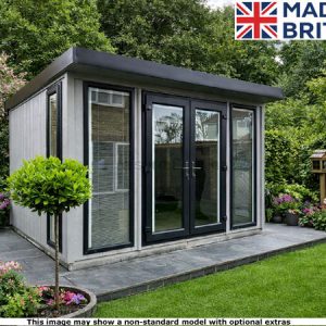 A Royal Buckingham 10x10 Garden Room with glass doors and windows, surrounded by a well-manicured lawn and garden.