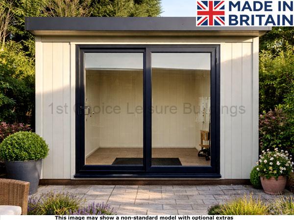 Royal Denham 8x6 Garden Room 1 Royal Denham Garden Room with cream-coloured walls, black trim, and glass double doors, surrounded by plants and flowers.