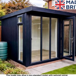 A Royal Marlow garden room modern garden room with large glass panels and a door. A green barrel sits to the side.
